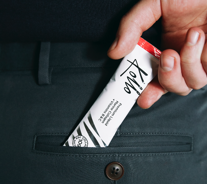Photo of a Kollo Premium Liquid marine collagen in a pocket